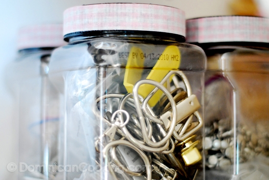 Organizing with Reused Jars: The trick to using jars for storage, and not make them look like you are a pack rat, is repetition. It makes it look 