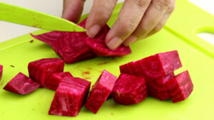 Chopping beetroot.