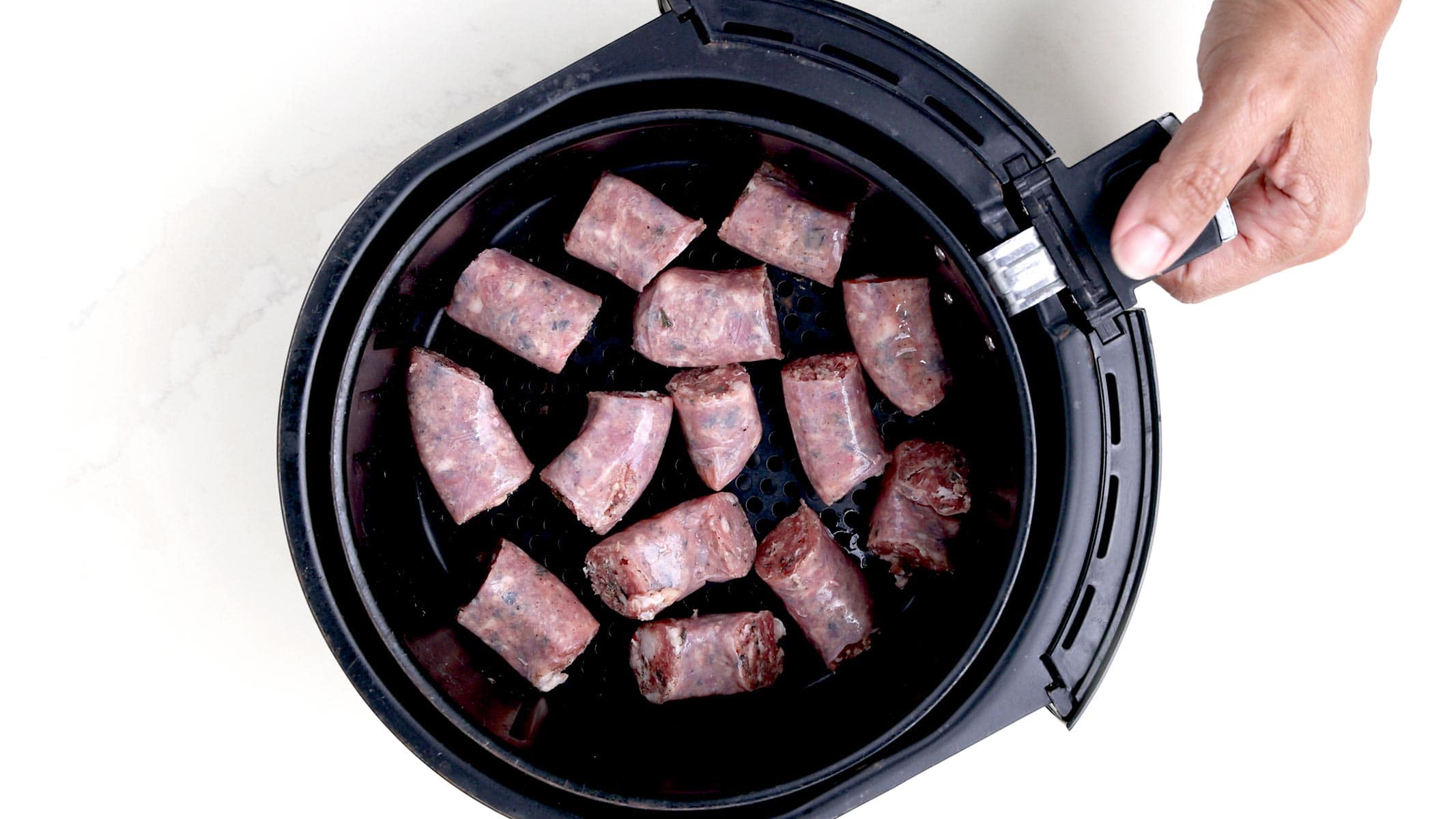 Longaniza en freidora de agua.